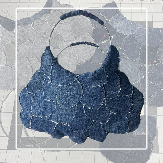 HandCrafted. Upcycled denim. One-Of-A-Kind designer mini bag.